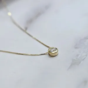 14k gold choker necklace with small white cz