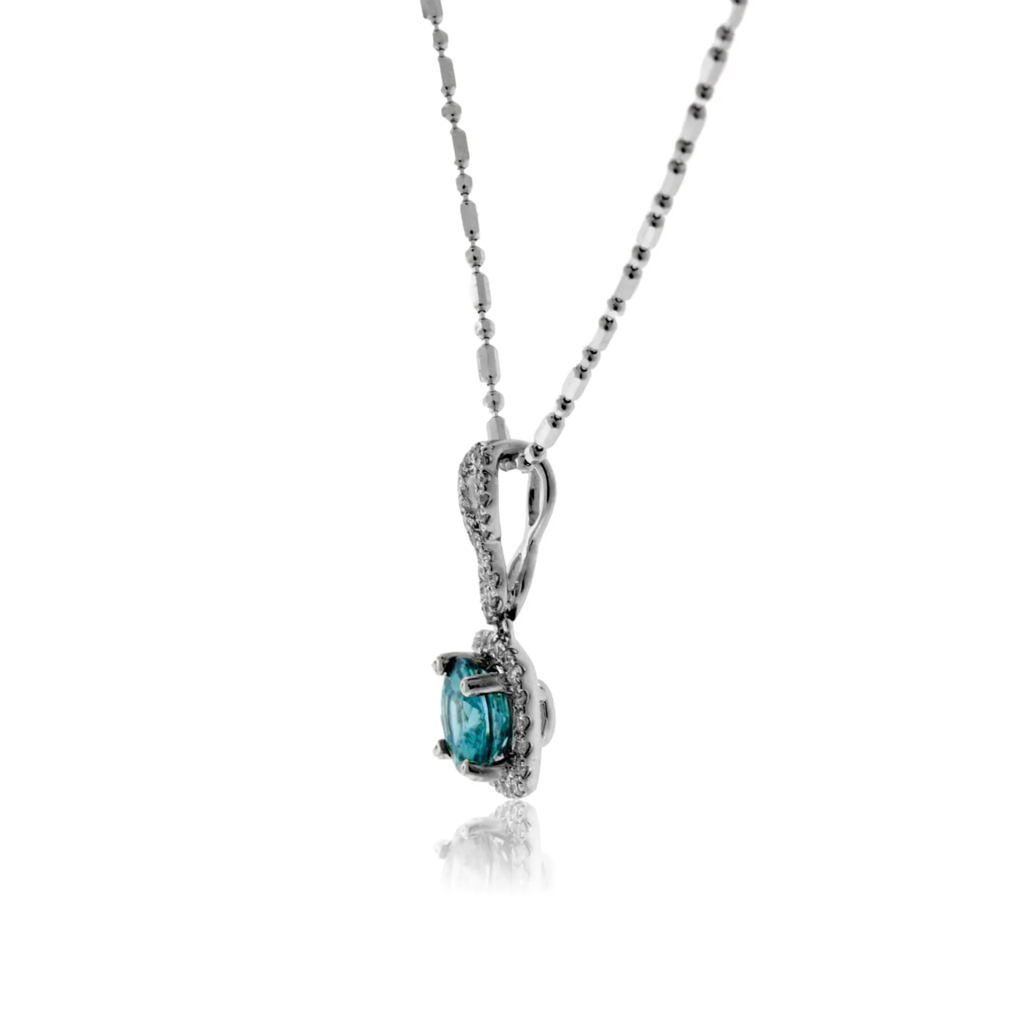 Bypassing Blue Zircon in Diamond Halo Drop Pendant