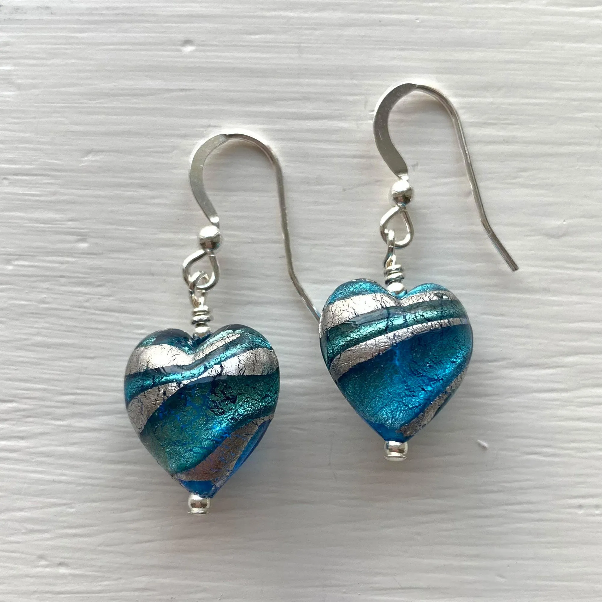 Earrings with turquoise (blue) and teal swirl over white gold Murano glass small heart drops