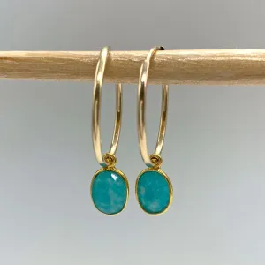 Gemstone earrings with amazonite (blue) oval crystal drops on gold medium hoops