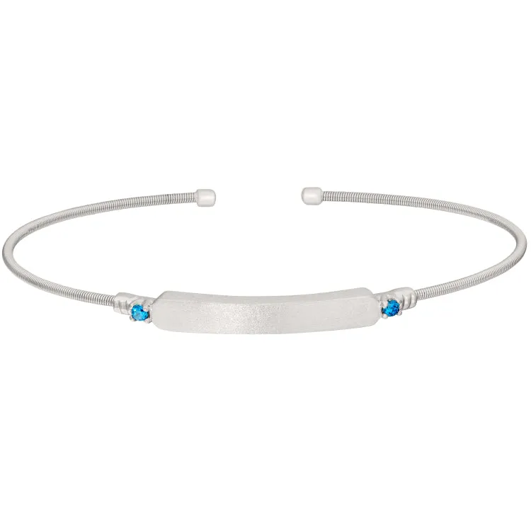 Rhodium Finish Sterling Silver Cable Cuff Bracelet with Name Plate and Simulated Blue Zircon Birth Gems - December